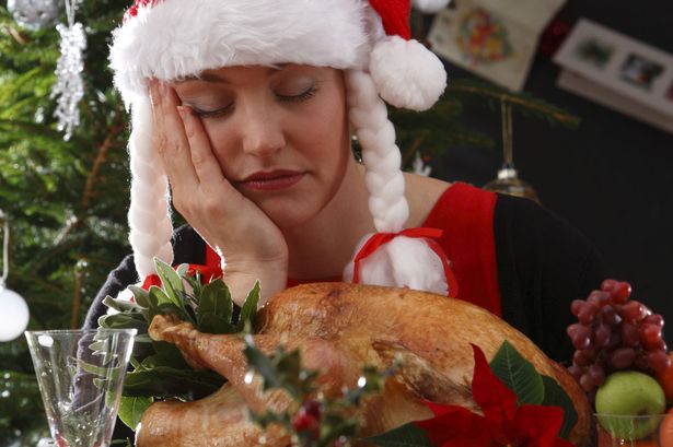 woman-asleep-with-christmas-dinner